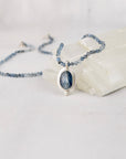 Front view of one-of-a-kind blue kyanite and aquamarine necklace with sterling silver toggle clasp