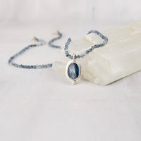 Front view of one-of-a-kind blue kyanite and aquamarine necklace with sterling silver toggle clasp