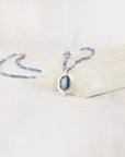 Handmade sterling silver necklace with faceted blue kyanite and aquamarine beads, close front view