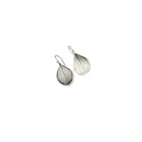 Overhead view of handmade sterling silver hydrangea petal impression dangle earrings with satin finish and patina, botanical jewelry crafted in Vermont