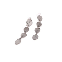 Handmade sterling silver hydrangea petal impression drop earrings, four connected petals with satin finish and patina, botanical jewelry crafted in Vermont