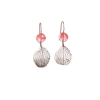 Front view of handmade sterling silver hydrangea petal impression dangle earrings with faceted rose quartz bead, botanical gemstone jewelry crafted in Vermont