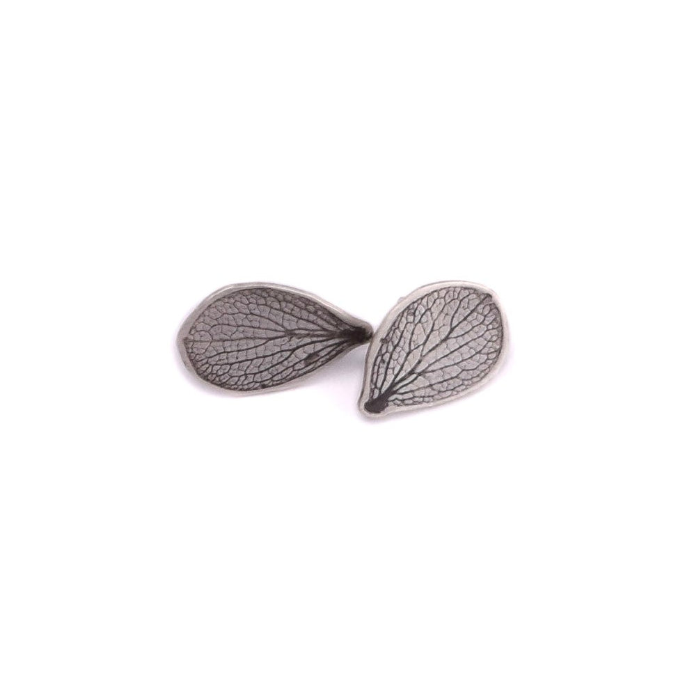 Handmade sterling silver hydrangea petal impression stud earrings with satin finish and patina, delicate botanical jewelry crafted in Vermont