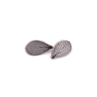 Handmade sterling silver hydrangea petal impression stud earrings with satin finish and patina, delicate botanical jewelry crafted in Vermont