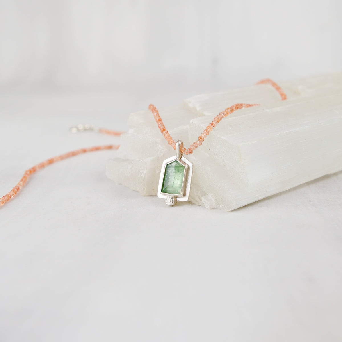 One-of-a-kind mint green kyanite pendant necklace with silk-strung sunstone rondelle beads, handmade in Vermont