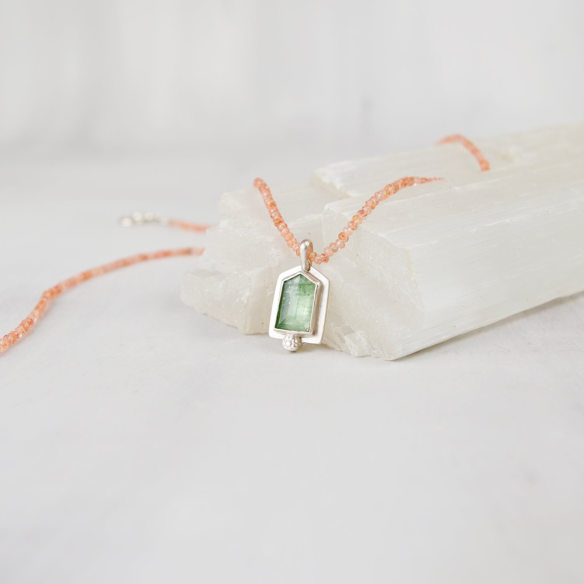 One-of-a-kind mint green kyanite pendant necklace with silk-strung sunstone rondelle beads, handmade in Vermont