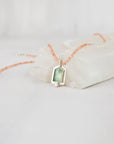 One-of-a-kind mint green kyanite pendant necklace with silk-strung sunstone rondelle beads, handmade in Vermont