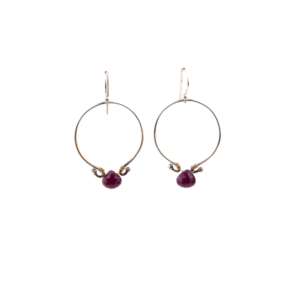 Front view of handmade sterling silver 30mm hoop earrings with genuine ruby briolette and brass wire wrapping, artisan gemstone jewelry crafted in Vermont