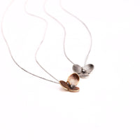 Handmade sterling silver and jeweler's brass hydrangea flower impression pendant necklaces on 18" sterling silver chain, crafted in Vermont
